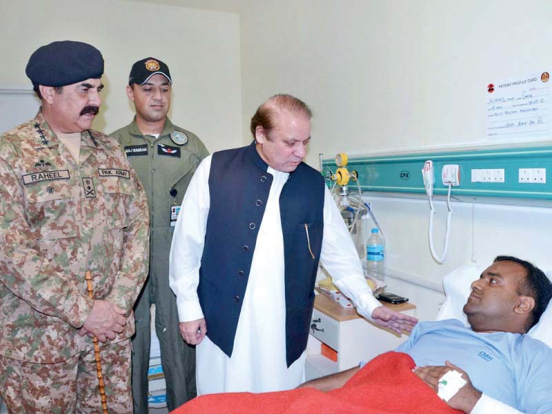 gen raheel and pm nawaz inquire about the health of a victim of the airbase attack photo app