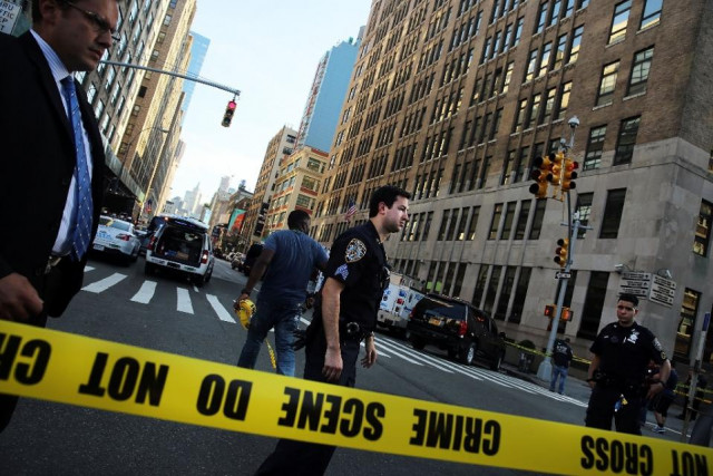 police cordon off the scene in lower manhattan where two people were shot at the federal immigration court on august 21 2015 in new york city photo afp police cordon off the scene in lower manhattan where two people were shot at the federal immigration court on august 21 2015 in new york city photo afp