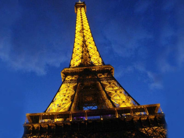 a breathtaking view of illuminated eiffel tower at night photo fazal khaliq express a breathtaking view of illuminated eiffel tower at night photo fazal khaliq express