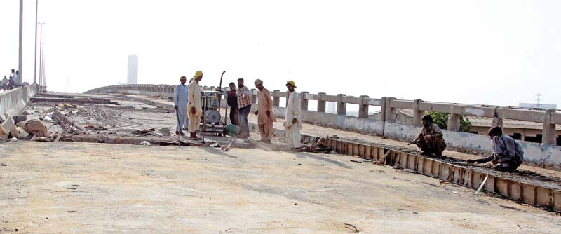 the 23 year old jam sadiq flyover has remained closed for traffic due to repair work since march of this year seven months on it is still not open to public photo aysha saleem express