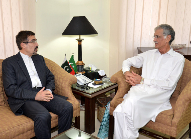 chief minister pervez khattak talking to iranian ambassador stationed peshawar at his office photo online