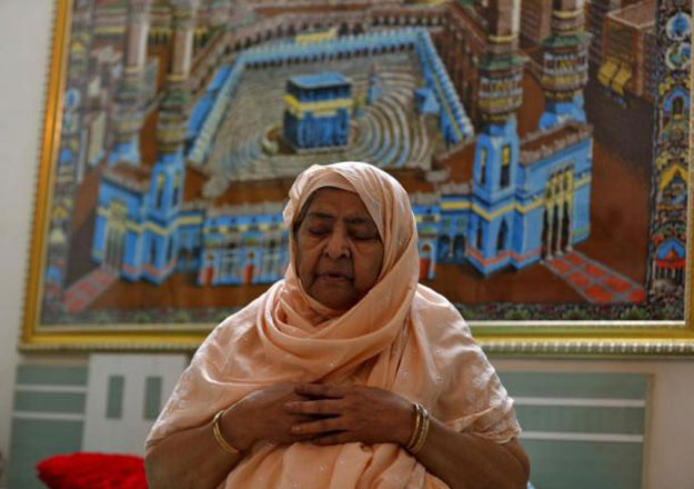 zakia jafri whose late husband a lawmaker for the congress party which now sits in opposition and was hacked to death by a hindu mob in riots offers prayers inside her son 039 s house in surat india september 15 2015