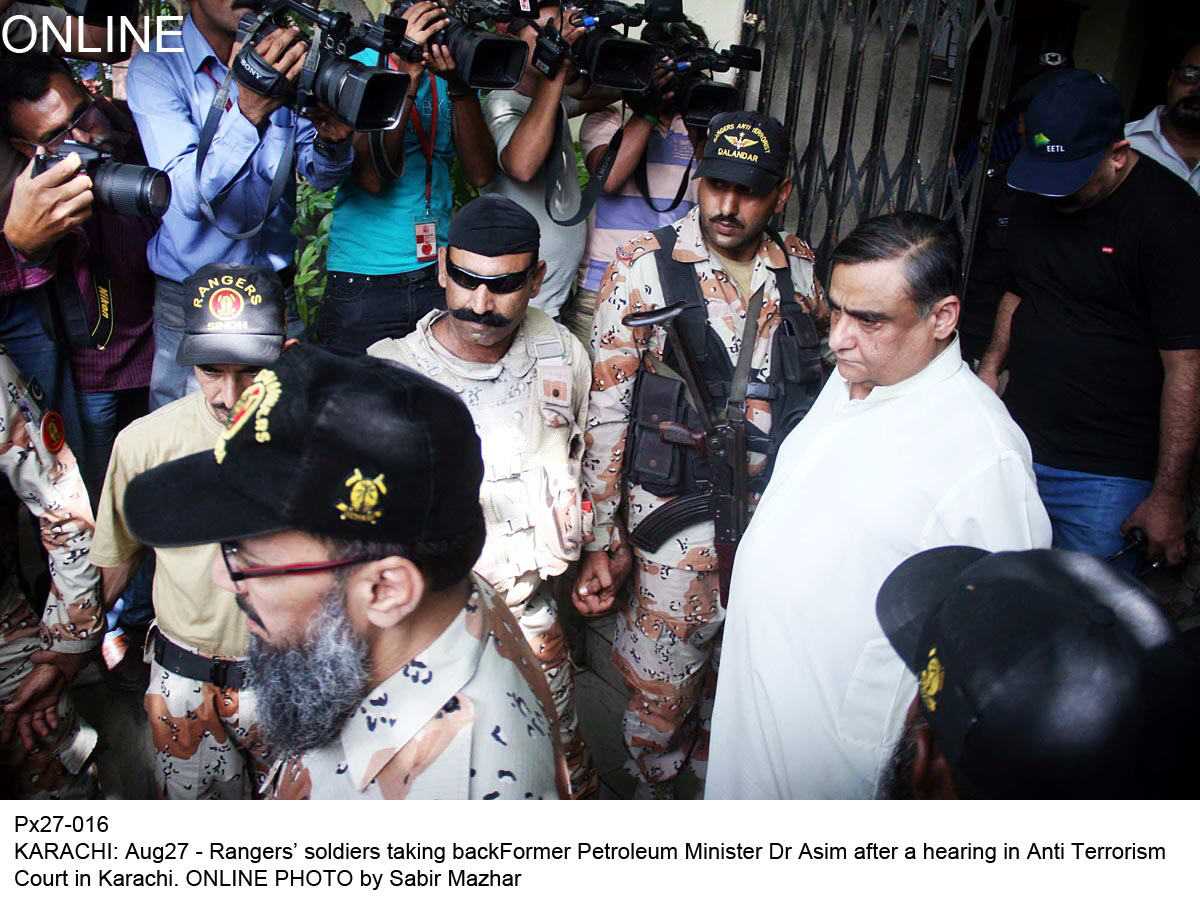 dr asim hussain in custody of rangers after an atc hearing in karachi on august 27 2015 photo online