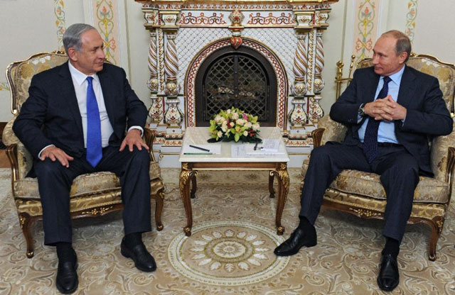 russian president vladimir putin right meets with israeli prime minister benjamin netanyahu at the novo ogaryovo residence outside moscow on september 21 2015 photo afp