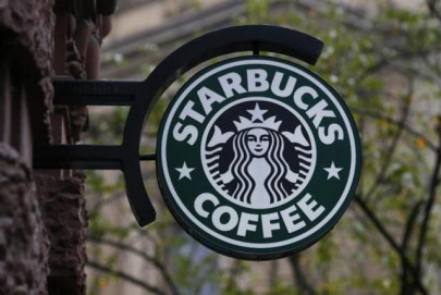 starbucks nike join 100 renewable energy pledge