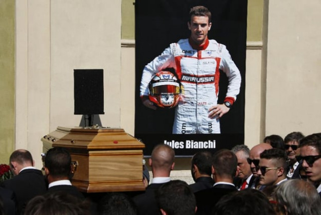 pallbearers carry the coffin of french formula one driver jules bianchi past a portrait of him during his funeral ceremony at the cathedrale sainte reparate in nice southeastern france on july 21 2015 photo afp pallbearers carry the coffin of french formula one driver jules bianchi past a portrait of him during his funeral ceremony at the cathedrale sainte reparate in nice southeastern france on july 21 2015 photo afp