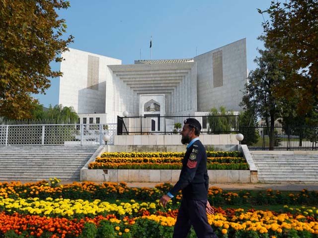a policeman walks in front of the supreme court building photo afp