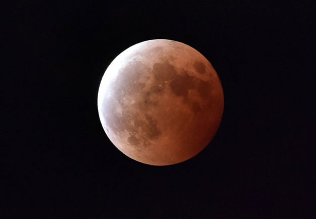 this file photo taken on october 8 2014 shows a lunar eclipse as seen from tokyo for the first time in decades skygazers are in for the double spectacle on september 28 2015 of a swollen quot supermoon quot bathed in the blood red light of a total eclipse photo afp this file photo taken on october 8 2014 shows a lunar eclipse as seen from tokyo for the first time in decades skygazers are in for the double spectacle on september 28 2015 of a swollen quot supermoon quot bathed in the blood red light of a total eclipse photo afp