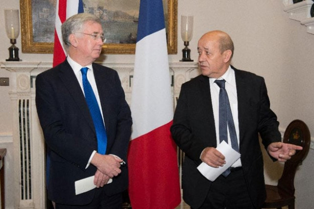 british defence minister michael fallon l and french defence minister jean yves le drian are concerned over russia 039 s military build up in syria photo afp british defence minister michael fallon l and french defence minister jean yves le drian are concerned over russia 039 s military build up in syria photo afp