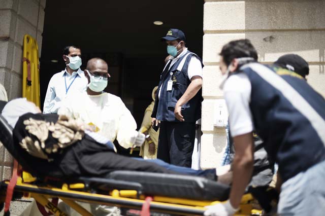 saudi medics tend to injured pilgrims after they arrived at an emergency hospital following a deadly stampede in mina near the holy city of makkah on the first day of eidul adha on september 24 2015 photo afp