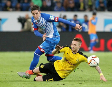 dortmund drop first points leave bayern top