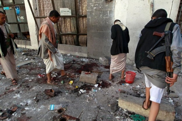 yemeni huthi rebels check the balili mosque in the capital sanaa following an explosion on the first day of eid al adha the feast of the sacrifice the most important holiday of the islamic calendar on september 24 2015 photo afp yemeni huthi rebels check the balili mosque in the capital sanaa following an explosion on the first day of eid al adha the feast of the sacrifice the most important holiday of the islamic calendar on september 24 2015 photo afp