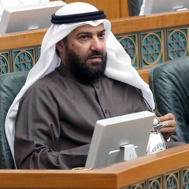 kuwaiti oil minister ali al omair r looks on as he attends a parliament session at kuwait 039 s national assembly in kuwait city on december 16 2014 photo afp