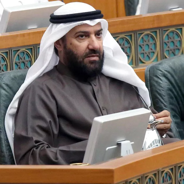 kuwaiti oil minister ali al omair r looks on as he attends a parliament session at kuwait 039 s national assembly in kuwait city on december 16 2014 photo afp kuwaiti oil minister ali al omair r looks on as he attends a parliament session at kuwait 039 s national assembly in kuwait city on december 16 2014 photo afp