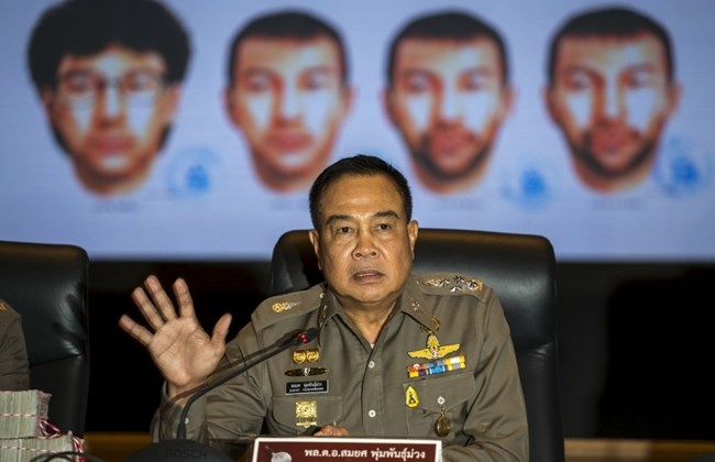 thai national police chief somyot pumpanmuang gestures during a news conference about the bangkok blast which killed 20 people including foreigners as a screen shows the different looks of a suspect photo reuters