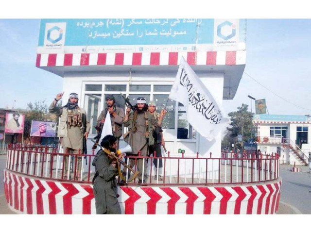 a picture shared by the afghan taliban spokesperson on twitter purportedly shows insurgents carrying flags in kunduz city on monday a picture shared by the afghan taliban spokesperson on twitter purportedly shows insurgents carrying flags in kunduz city on monday