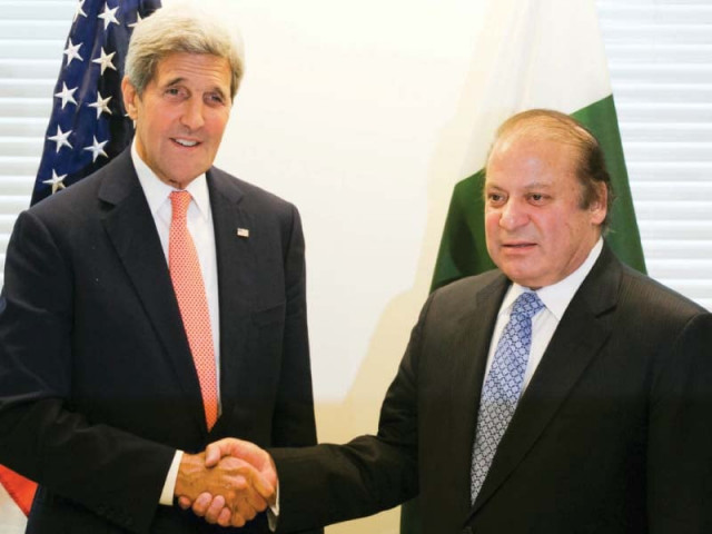 pm shakes hands with john kerry at the un photo afp pm shakes hands with john kerry at the un photo afp