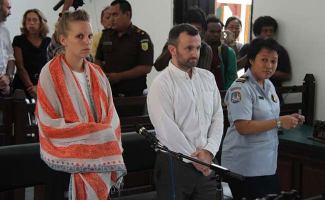 french journalists valentine bourrat l and thomas dandois c face trial before a court in jayapura in indonesia on october 20 2014 photo afp