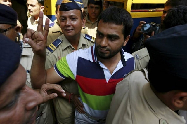 one of 12 men convicted of planning several blasts on crowded commuter trains in mumbai in 2006 gestures as he is escorted to a court in mumbai india sept 30 2015 photo reuters one of 12 men convicted of planning several blasts on crowded commuter trains in mumbai in 2006 gestures as he is escorted to a court in mumbai india sept 30 2015 photo reuters