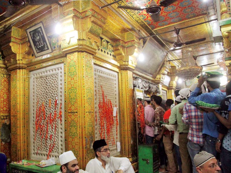 attendees are in a world of their own a world that rests at the footsteps of nizamuddin and his disciple ameer khusru
