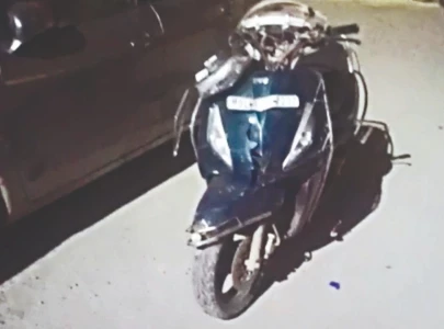 scooty riding woman killed in road crash