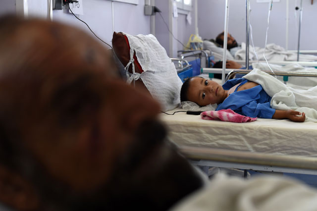 in this photograph taken on may 21 2015 an afghan child receives treatment at the medecins sans frontieres msf or doctors without borders hospital in the northern city of kunduz photo afp