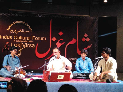orange coloured evening sindhi poet singer captivate audience