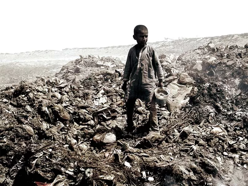 children as young as five years of age help their families look for recyclable items among the piles of rubbish dumped near their village the residents almost all of whom work in this profession care little for health or education photos express children as young as five years of age help their families look for recyclable items among the piles of rubbish dumped near their village the residents almost all of whom work in this profession care little for health or education photos express