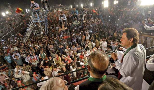 imran khan addresses his supporters at doongi ground in lahore photo afp imran khan addresses his supporters at doongi ground in lahore photo afp