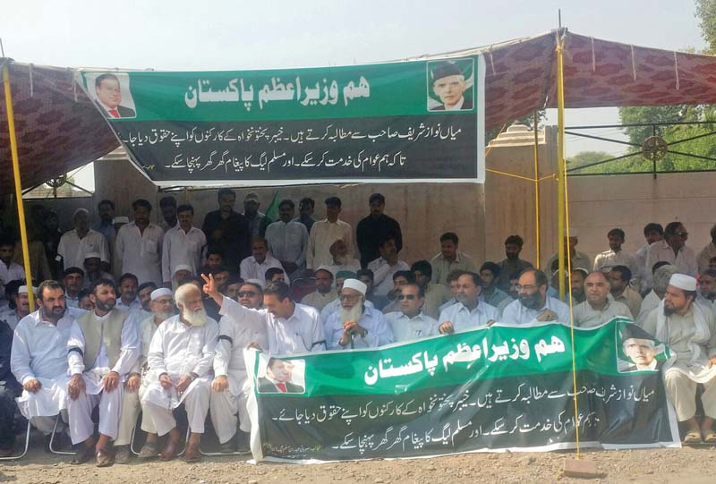 protesters sit outside peshawar press club photo express