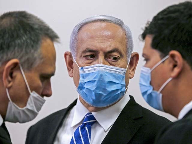 israeli prime minister benjamin netanyahu speaks with his lawyer photo afp israeli prime minister benjamin netanyahu speaks with his lawyer photo afp