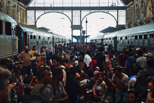 chaos at budapest railway station as thousands of asylum seekers clamoured to get on trains mainly headed to germany photo afp