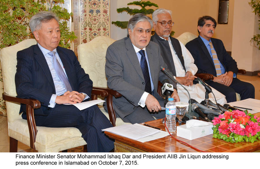 finance minister mohammad ishaq dar and president aiib jin liqun address a press conference in islamabad on october 7 2015 photo pid