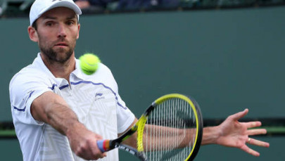 karlovic whacks aces record   but exits anyway