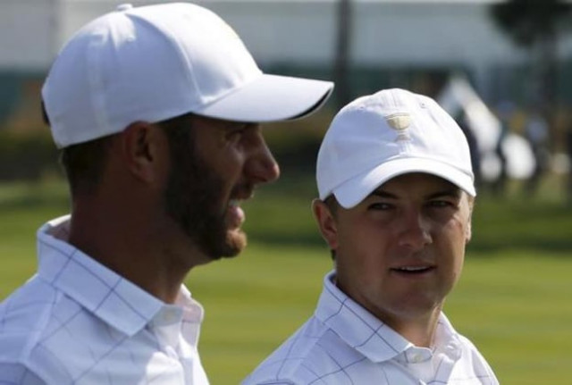 u s team member jordan spieth r talks with team mate dustin johnson on the first hole during the opening foursome matches for the 2015 presidents cup golf tournament at the jack nicklaus golf club in incheon south korea october 8 2015 photo reuters u s team member jordan spieth r talks with team mate dustin johnson on the first hole during the opening foursome matches for the 2015 presidents cup golf tournament at the jack nicklaus golf club in incheon south korea october 8 2015 photo reuters