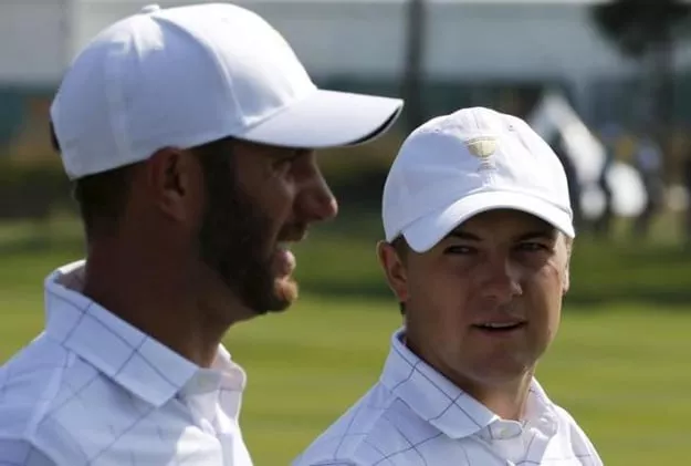 u s team member jordan spieth r talks with team mate dustin johnson on the first hole during the opening foursome matches for the 2015 presidents cup golf tournament at the jack nicklaus golf club in incheon south korea october 8 2015 photo reuters u s team member jordan spieth r talks with team mate dustin johnson on the first hole during the opening foursome matches for the 2015 presidents cup golf tournament at the jack nicklaus golf club in incheon south korea october 8 2015 photo reuters