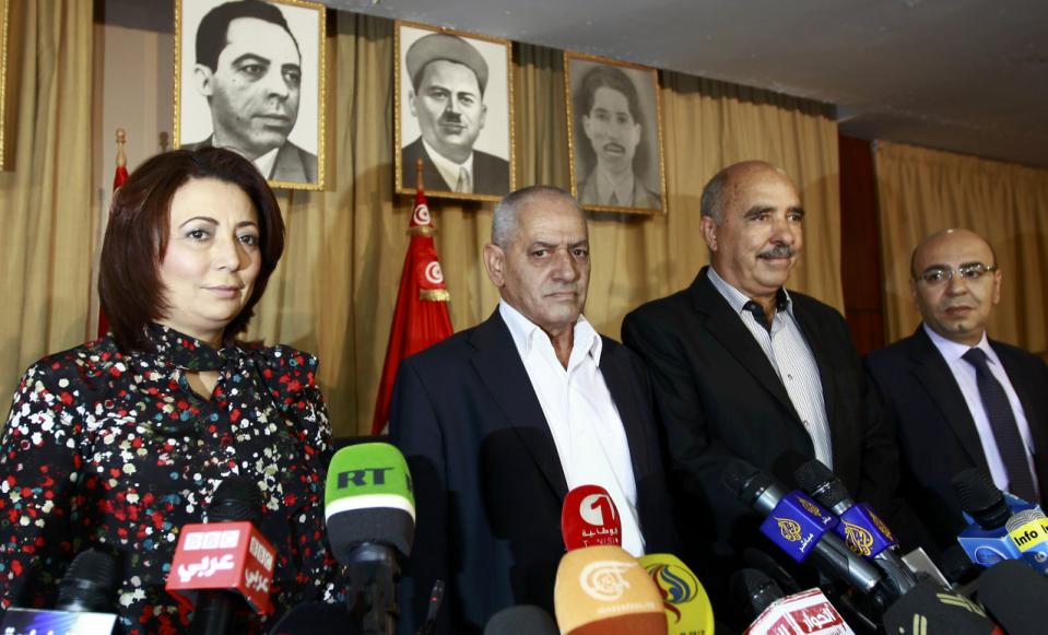 president of the tunisian employers union wided bouchamaoui secretary general of the tunisian general labour union houcine abassi president of the tunisian human rights league abdessattar ben moussa and the president of the national bar association mohamed fadhel mahmoud l r photo reuters