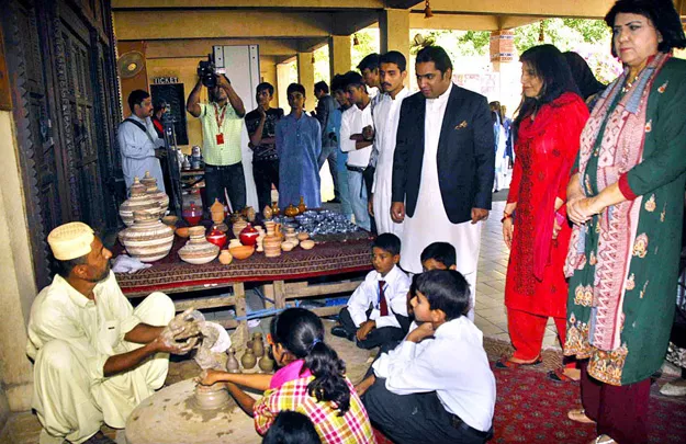 md baitul maal barrister abid waheed sheikh viewing the displayed stuff on different stalls during harnessing culture with education programme titled craft of the month in lok virsa photo app md baitul maal barrister abid waheed sheikh viewing the displayed stuff on different stalls during harnessing culture with education programme titled craft of the month in lok virsa photo app