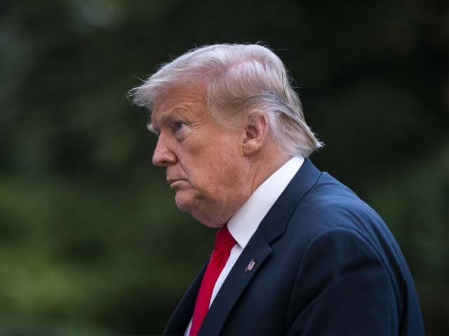 president donald trump walks to the white house photo afp