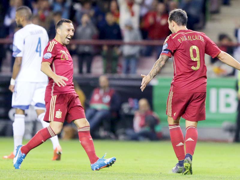 cazorla alcacer scored a brace each to further their claims of a starting spot for spain s defending campaign next year photo afp
