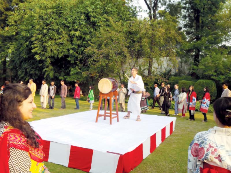 japanese ambassador hiroshi inomata plays traditional wodaiko drums photo vaqas asghar express