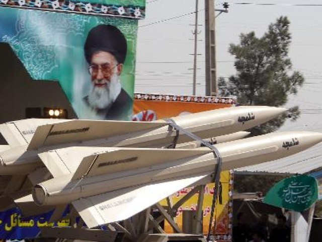 a military truck carries shalamcheh missiles in a military parade in tehran on september 22 2013 photo afp file