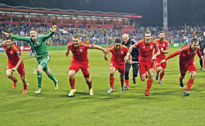 wales who last played in a major tournament at the 1958 world cup clinched second place in group h and qualified for the euros courtesy of israel losing 2 1 at home to cyprus photo reuters