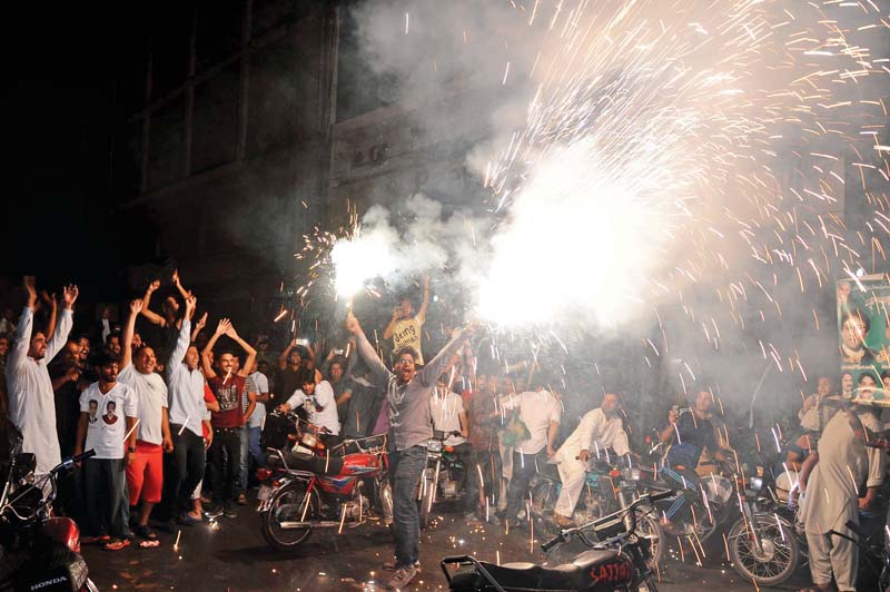 pml n supporters celebrate the success of ayaz sadiq photo tariq hassan express