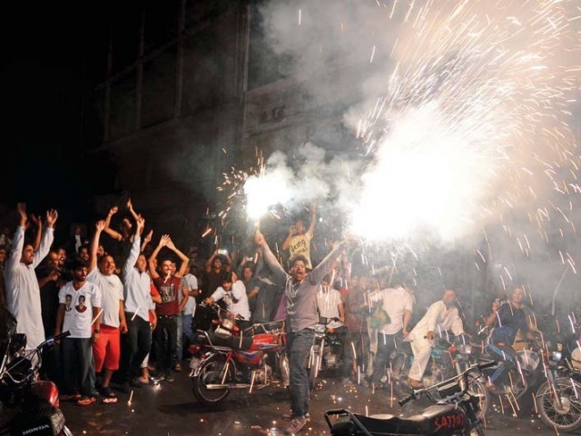 pml n supporters celebrate the success of ayaz sadiq in na 122 by polls on october 11 2015 photo tariq hassan express