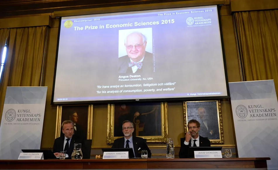 goeran k hansson permanent secretary of the royal swedish academy of sciences c announces angus deaton of britain as the winner of the 2015 nobel economics prize next to members of the prize committee tore ellingsen l and jakob svensson on october 12 2015 in stockholm photo afp goeran k hansson permanent secretary of the royal swedish academy of sciences c announces angus deaton of britain as the winner of the 2015 nobel economics prize next to members of the prize committee tore ellingsen l and jakob svensson on october 12 2015 in stockholm photo afp