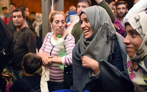 refugees at saalfeld train station after travelling to germany via austria and hungary photo telegraph corbis