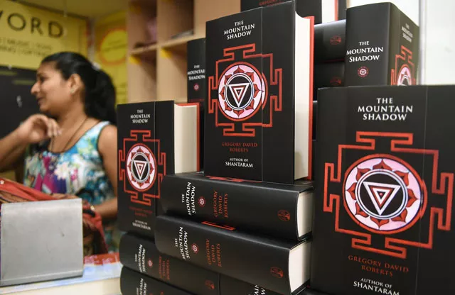 copies of gregory david roberts new book quot the mountain shadow quot are displayed at a book store in mumbai on october 13 2015 a long awaited sequel to quot shantaram quot went on sale on october 13 12 years after the novel about an escaped australian convict in india became a huge backpacker hit selling four million copies worldwide photo afp copies of gregory david roberts new book quot the mountain shadow quot are displayed at a book store in mumbai on october 13 2015 a long awaited sequel to quot shantaram quot went on sale on october 13 12 years after the novel about an escaped australian convict in india became a huge backpacker hit selling four million copies worldwide photo afp