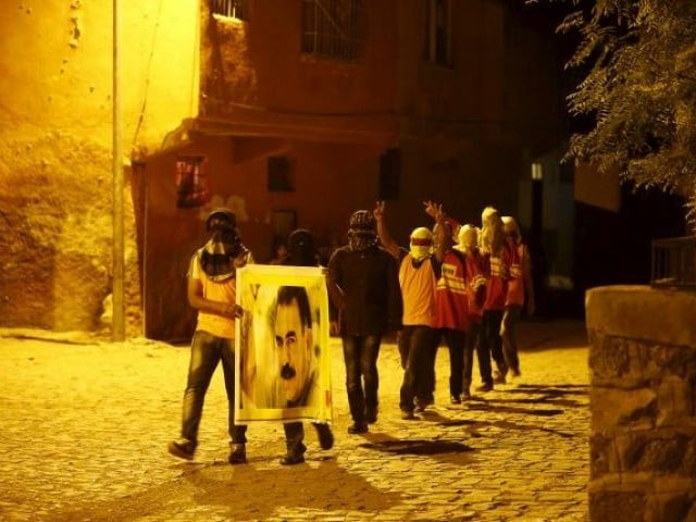 masked members of ydg h youth wing of the outlawed kurdistan workers party pkk shout slogans as they hold a portrait of pkk 039 s jailed leader abdullah ocalan in diyarbakir turkey on september 1 2015 photo reuters masked members of ydg h youth wing of the outlawed kurdistan workers party pkk shout slogans as they hold a portrait of pkk 039 s jailed leader abdullah ocalan in diyarbakir turkey on september 1 2015 photo reuters
