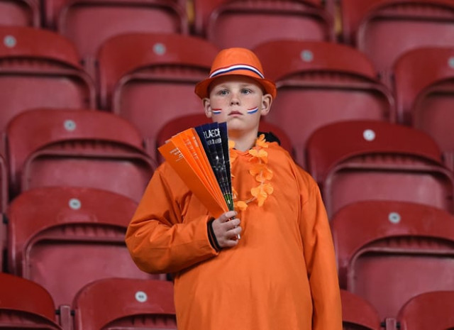 a dutch supporter reacts at the end of the euro 2016 qualifying football match between the netherlands vs czech republic at the amsterdam arena in amsterdam on october 13 2015 photo afp a dutch supporter reacts at the end of the euro 2016 qualifying football match between the netherlands vs czech republic at the amsterdam arena in amsterdam on october 13 2015 photo afp